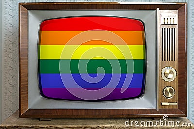 LGBT rainbow flag, old tube vintage TV with the national flag Pride flag on the screen, the concept of eternal values â€‹â€‹on Stock Photo